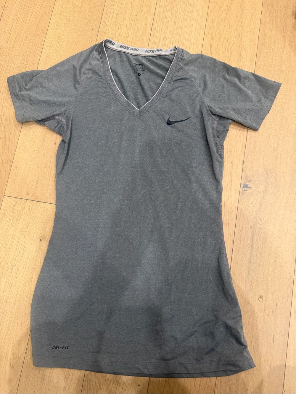 Nike Women's Short Sleeve V-Neck Dri-FIT Top in Charcoal